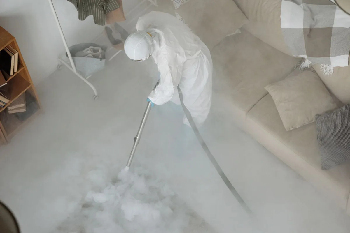 Biohazard cleanup technician in protective equipment, Shady Hills, FL
